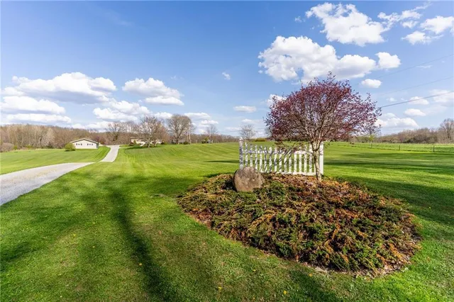 a view of a golf course with a garden
