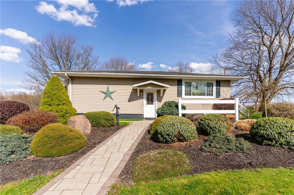 946 Crouser School Road Sandy Lake, PA 16145 - Photo 33 of 41 a front view of a house with garden