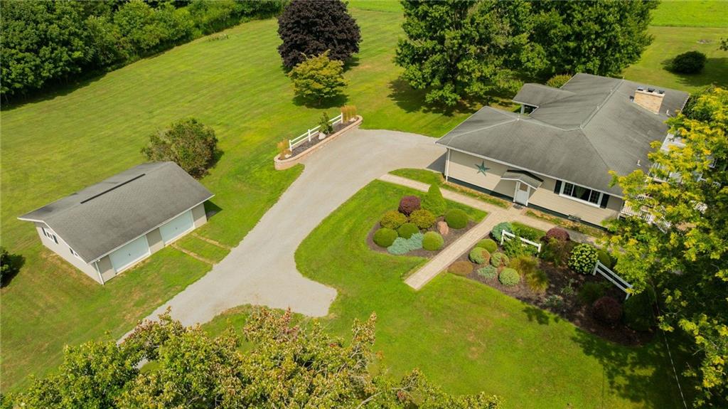 946 Crouser School Road Sandy Lake, PA 16145 - Photo 39 of 41 an aerial view of a house with a swimming pool