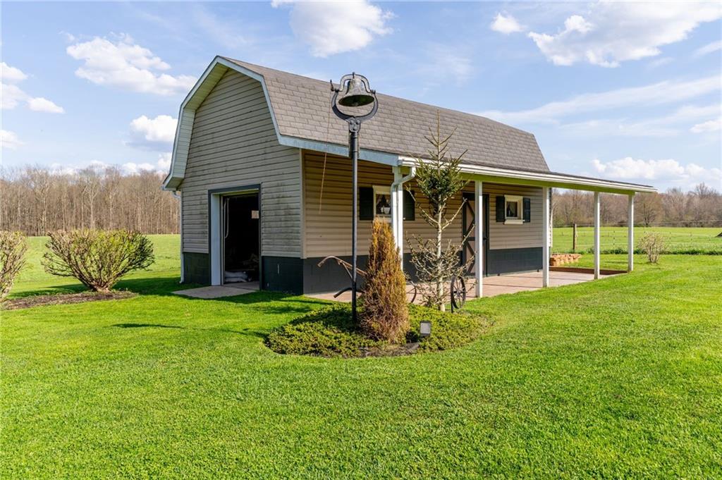 946 Crouser School Road Sandy Lake, PA 16145 - Photo 6 of 41 a view of a house with backyard