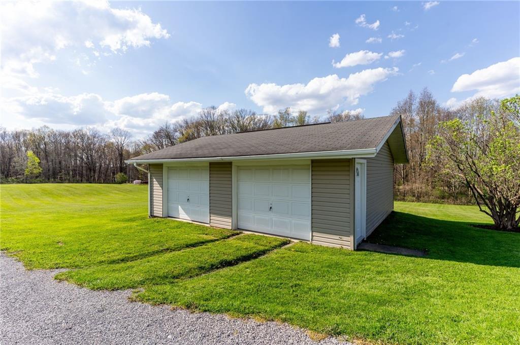 946 Crouser School Road Sandy Lake, PA 16145 - Photo 7 of 41 a front view of a house with garden