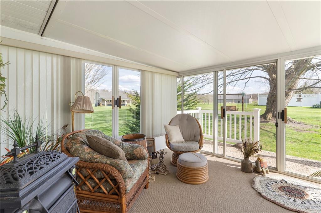 946 Crouser School Road Sandy Lake, PA 16145 - Photo 10 of 41 a living room with furniture and a large window