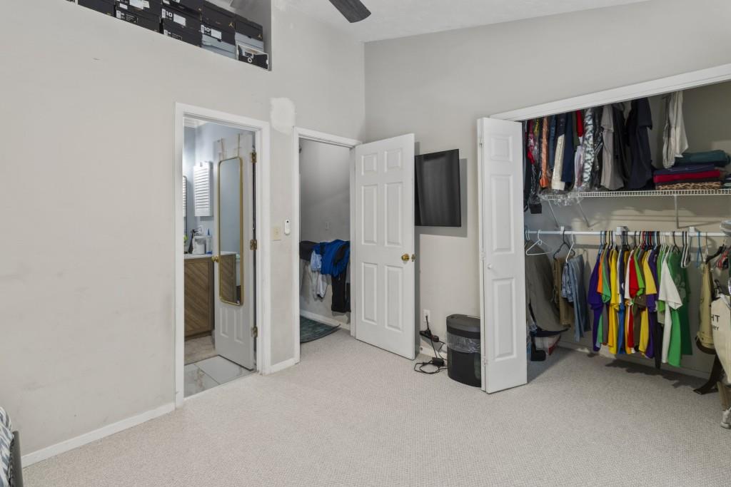 3509 Mt Vernon Circle Atlanta, GA 30340 - Photo 17 of 20 a view of a living room with clothes and shoes