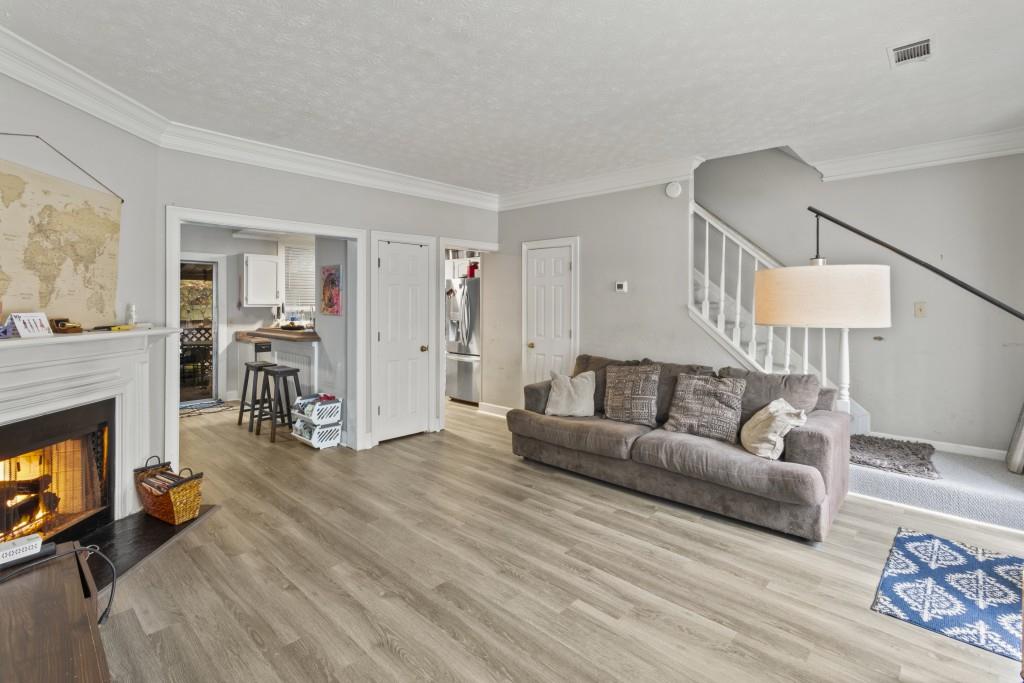 3509 Mt Vernon Circle Atlanta, GA 30340 - Photo 9 of 20 a living room with furniture and a fireplace