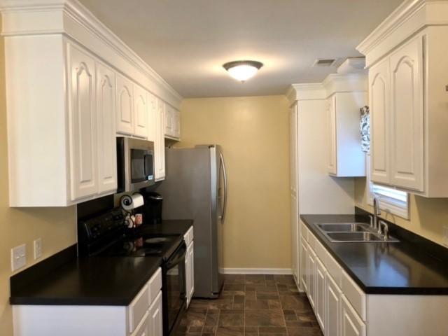 135 Travis Hill Road Moncks Corner, SC 29461 - Photo 10 of 29 White Cabinets