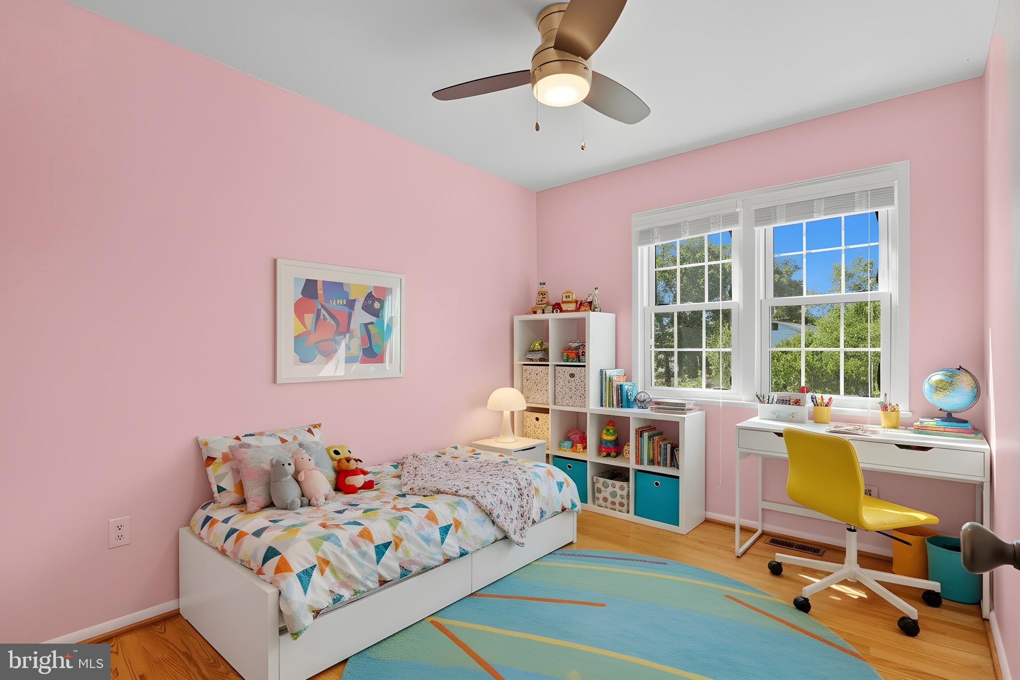 1503 Coat Ridge Road Herndon, VA 20170 - Photo 13 of 39 a bedroom with a bed and a desk