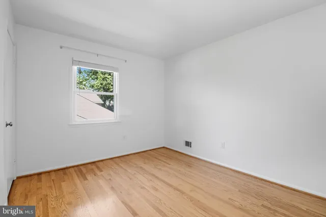 a view of a room that has a window in it