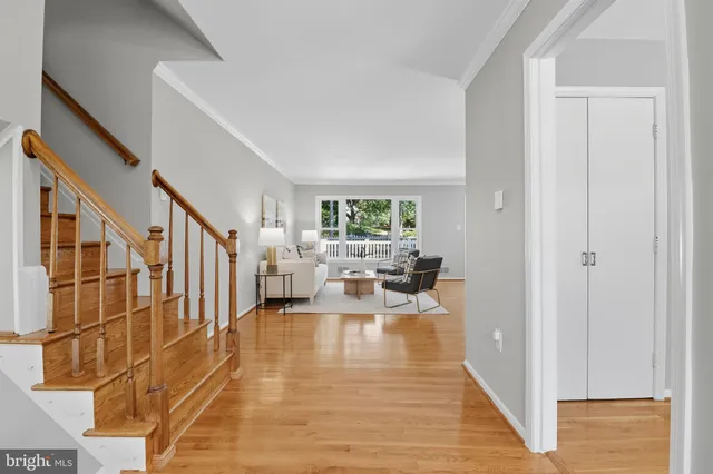 a view of an entryway with wooden floor