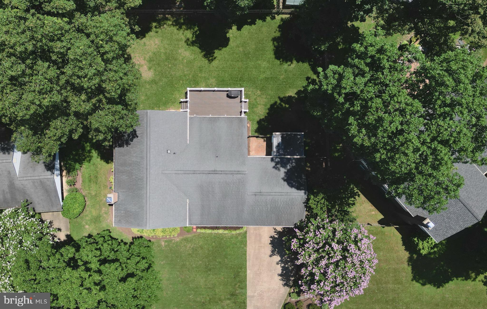 1503 Coat Ridge Road Herndon, VA 20170 - Photo 34 of 39 an aerial view of a house with a yard and garden