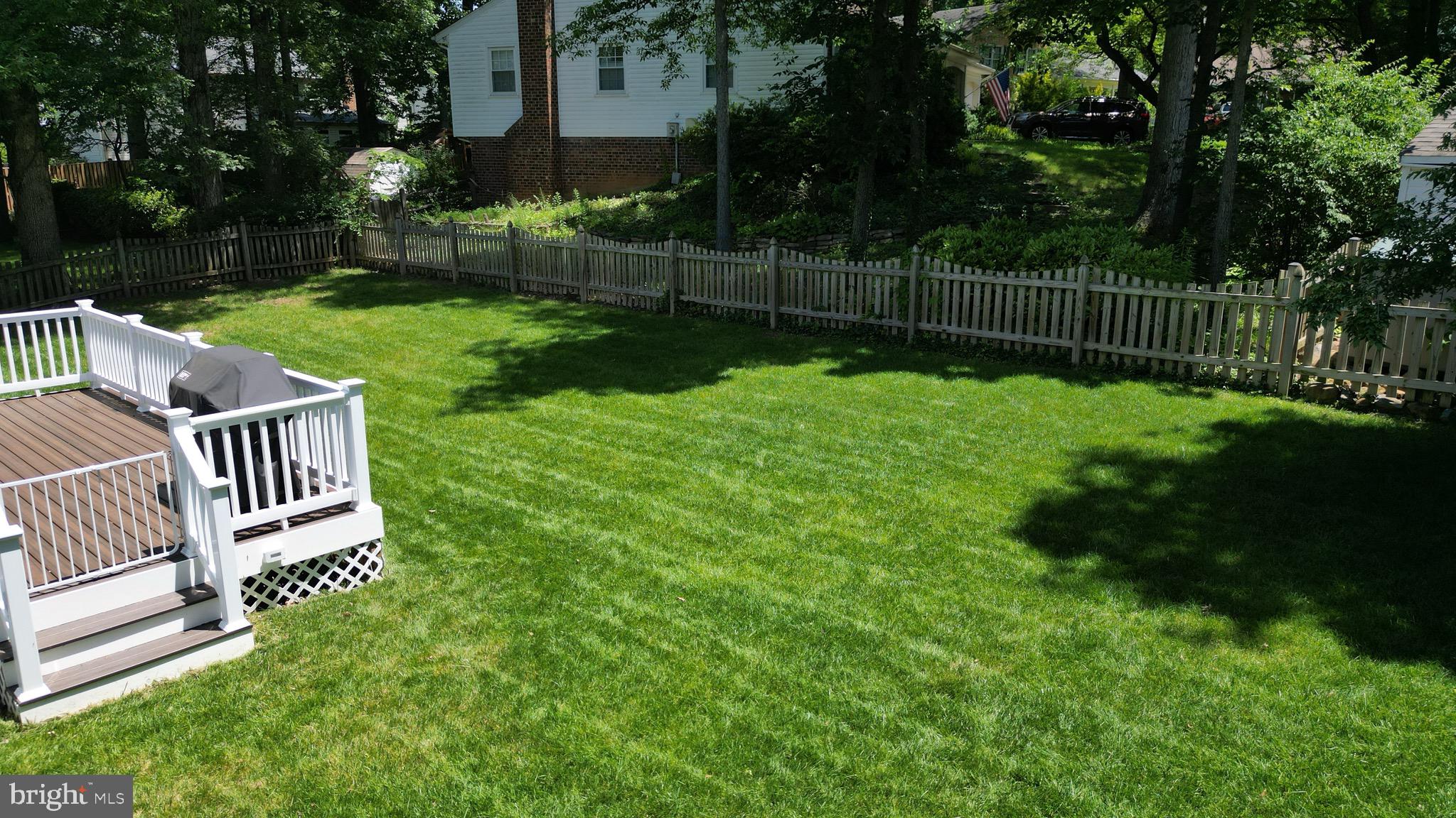 1503 Coat Ridge Road Herndon, VA 20170 - Photo 36 of 39 a view of a chair and table in the garden