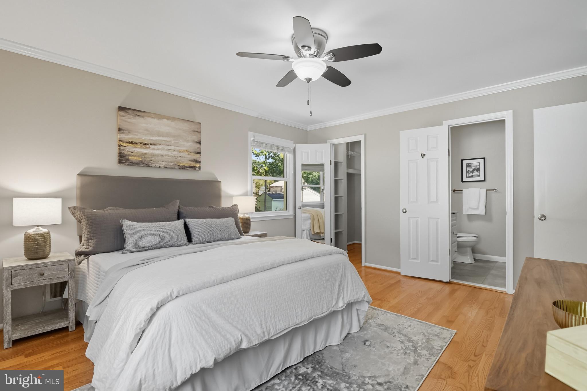 1503 Coat Ridge Road Herndon, VA 20170 - Photo 9 of 39 a spacious bedroom with a bed and a dresser