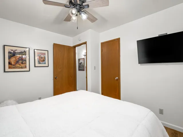 a view of an entryway with a ceiling fan