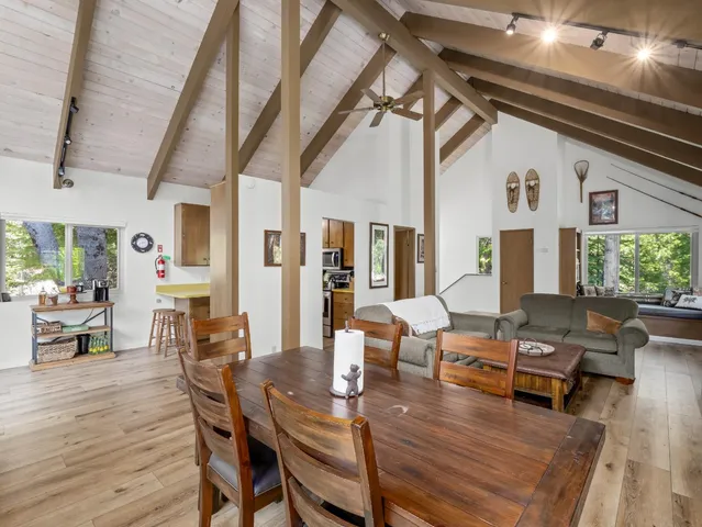 a kitchen with a refrigerator a stove top oven a sink and dishwasher