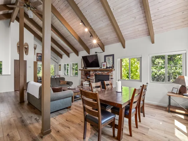a kitchen with stainless steel appliances a sink stove and cabinets