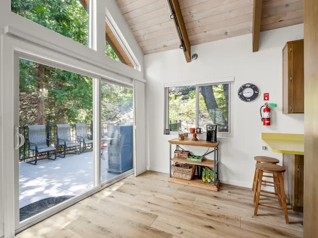 a kitchen with a stove microwave and sink