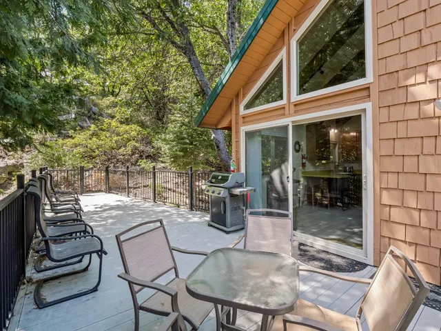 a view of a balcony with chairs