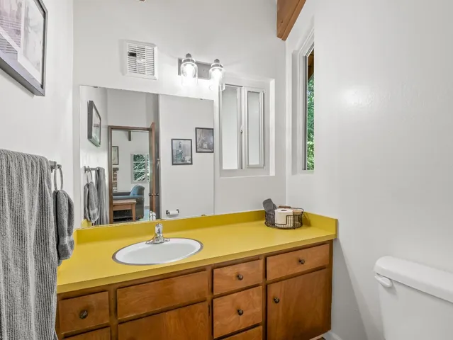 a view of a window with white walls and wooden floor