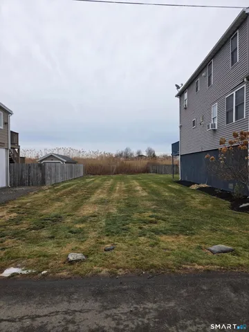 a large building with a ocean view