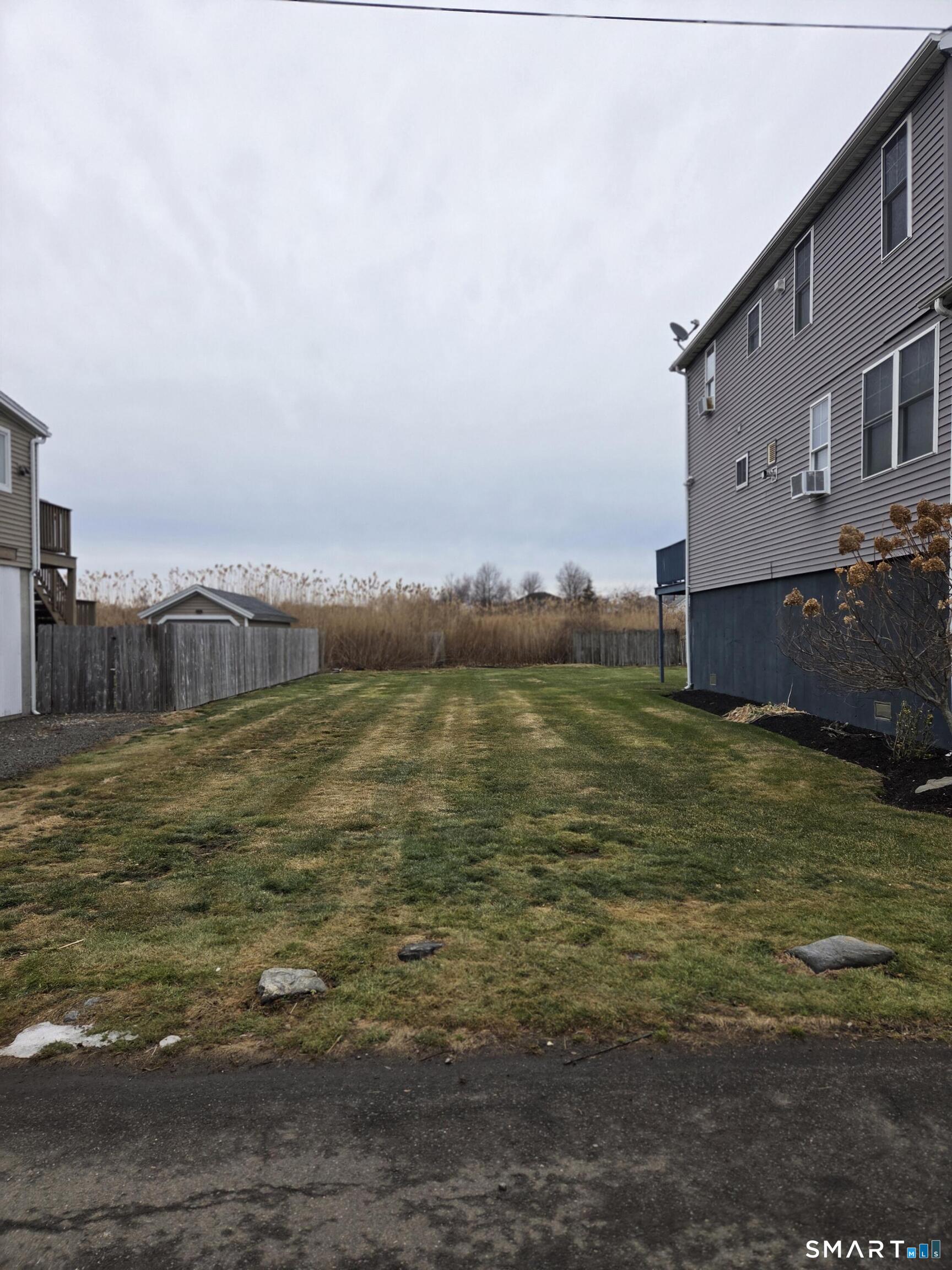 47 James Street Milford, CT 06460 - Photo 2 of 6 a large building with a ocean view