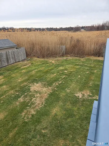 a view of an ocean from a yard