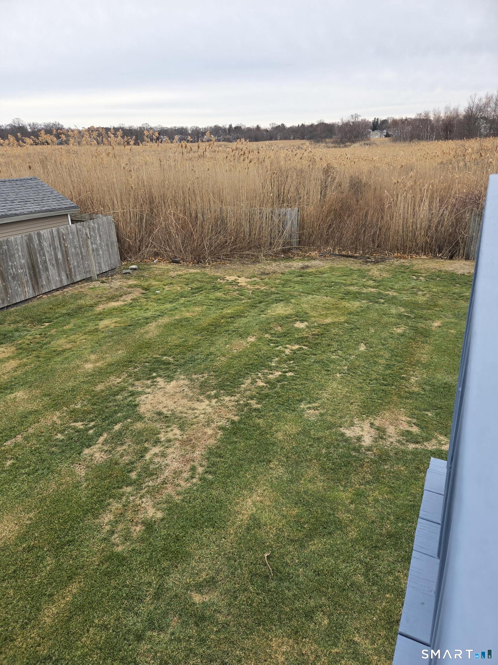 47 James Street Milford, CT 06460 - Photo 6 of 6 a view of a lake with houses in background