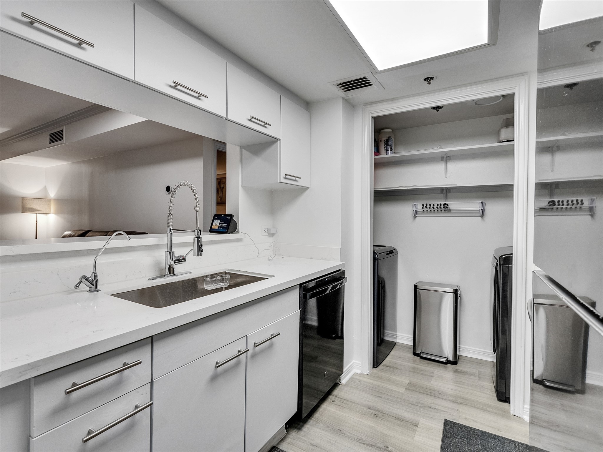 3525 Sage Road, Unit 812 Houston, TX 77056 - Photo 12 of 28 a kitchen with a sink and a refrigerator