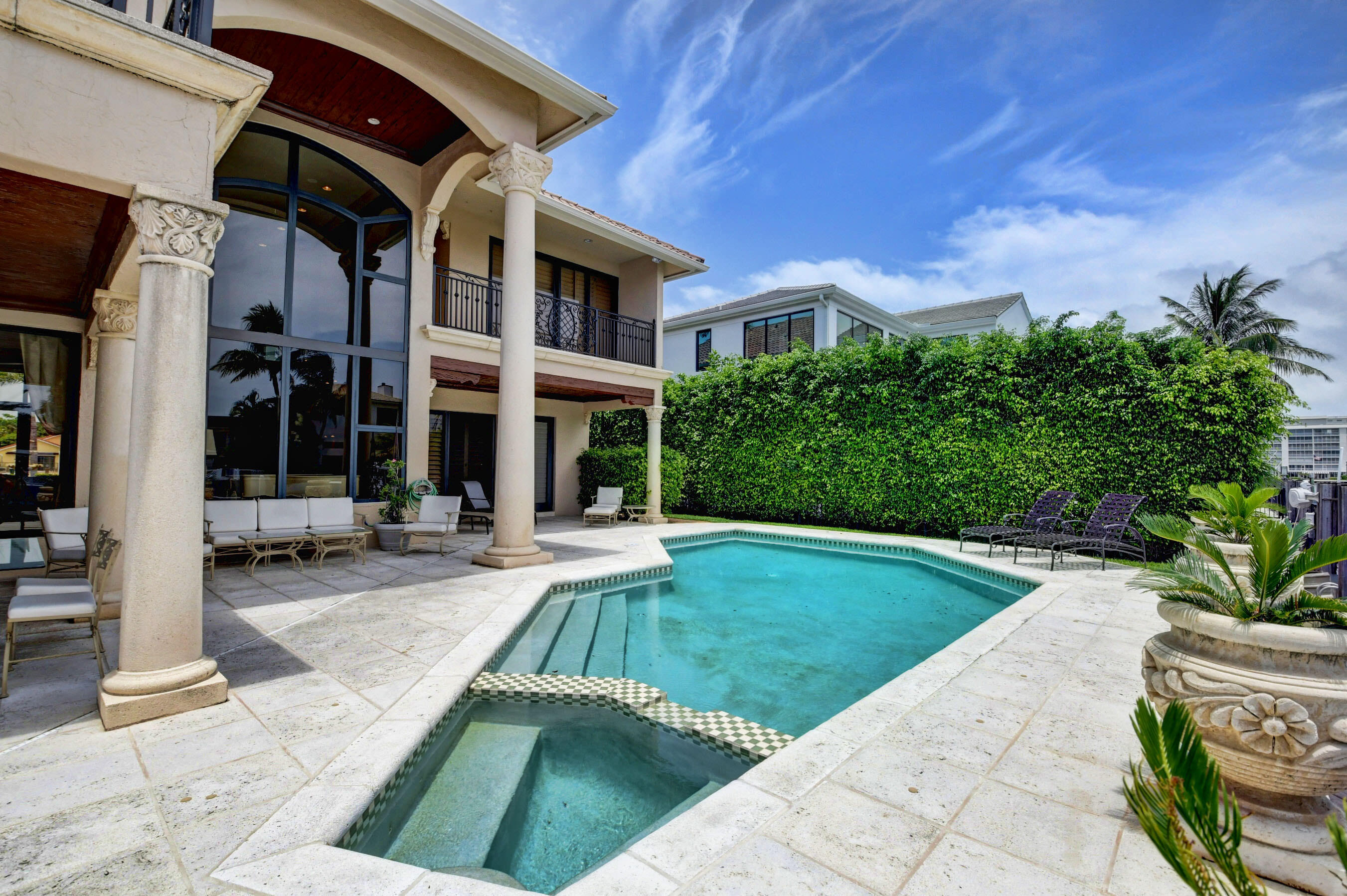 860 Northeast 79th Street Boca Raton, FL 33487 - Photo 107 of 109 a view of a house with backyard porch and sitting area