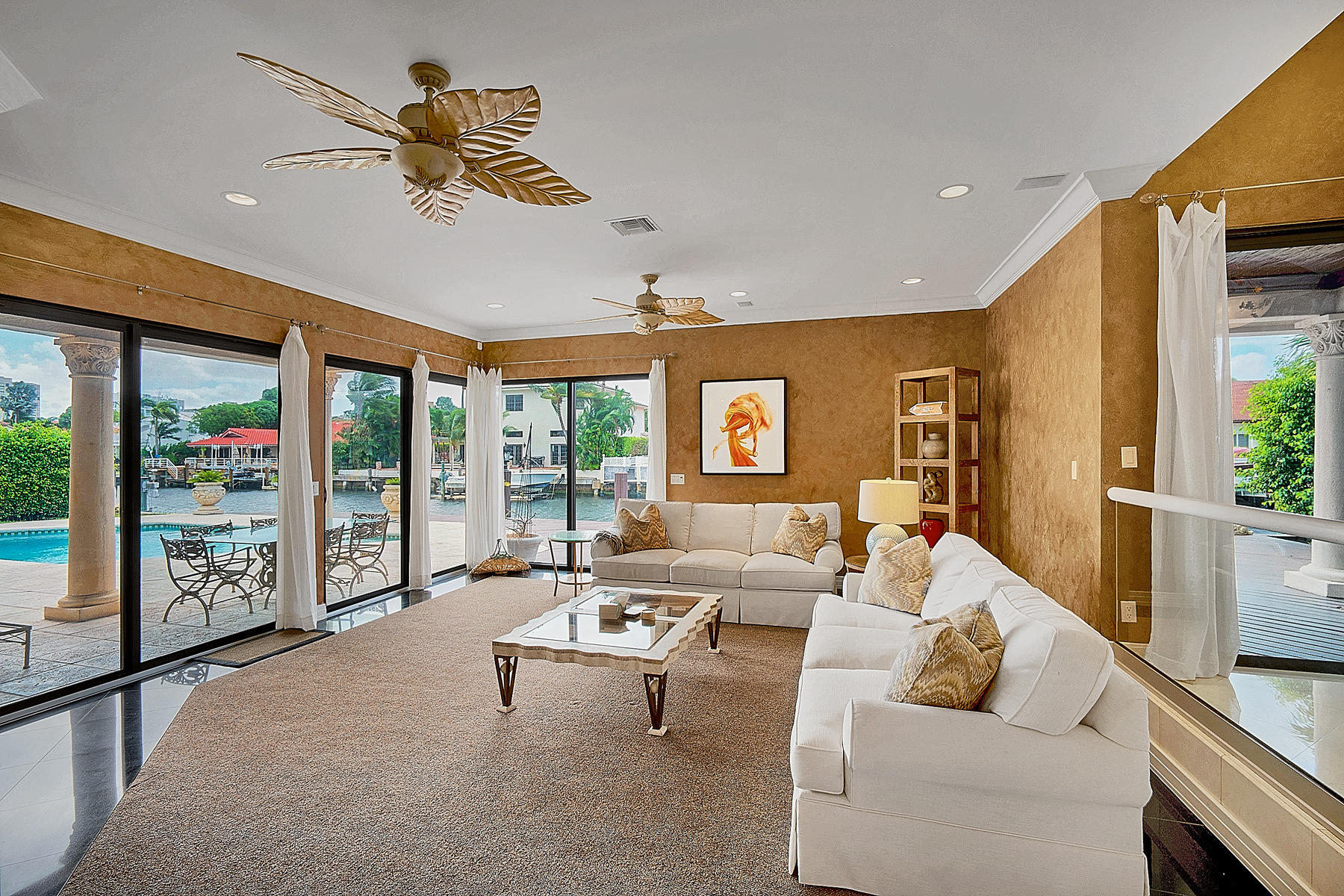 860 Northeast 79th Street Boca Raton, FL 33487 - Photo 24 of 109 a living room with furniture and a large window