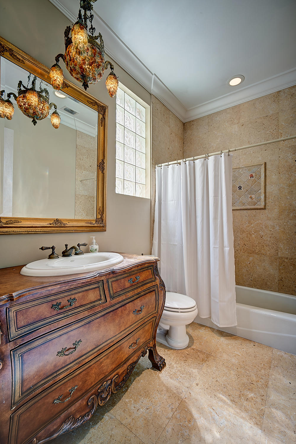 860 Northeast 79th Street Boca Raton, FL 33487 - Photo 41 of 109 a bathroom with a sink a toilet and shower curtain