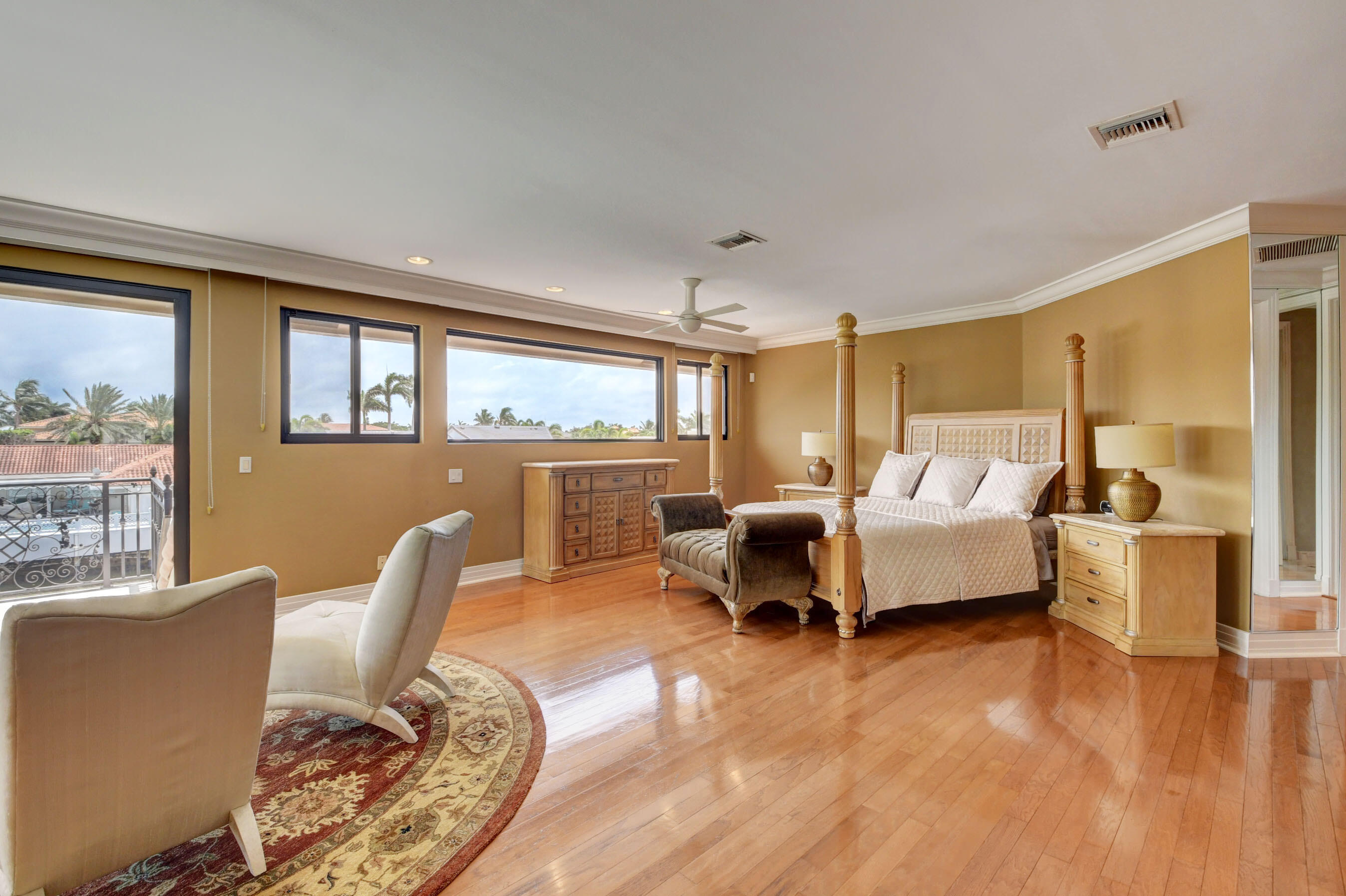 860 Northeast 79th Street Boca Raton, FL 33487 - Photo 49 of 109 a living room with furniture and a large window
