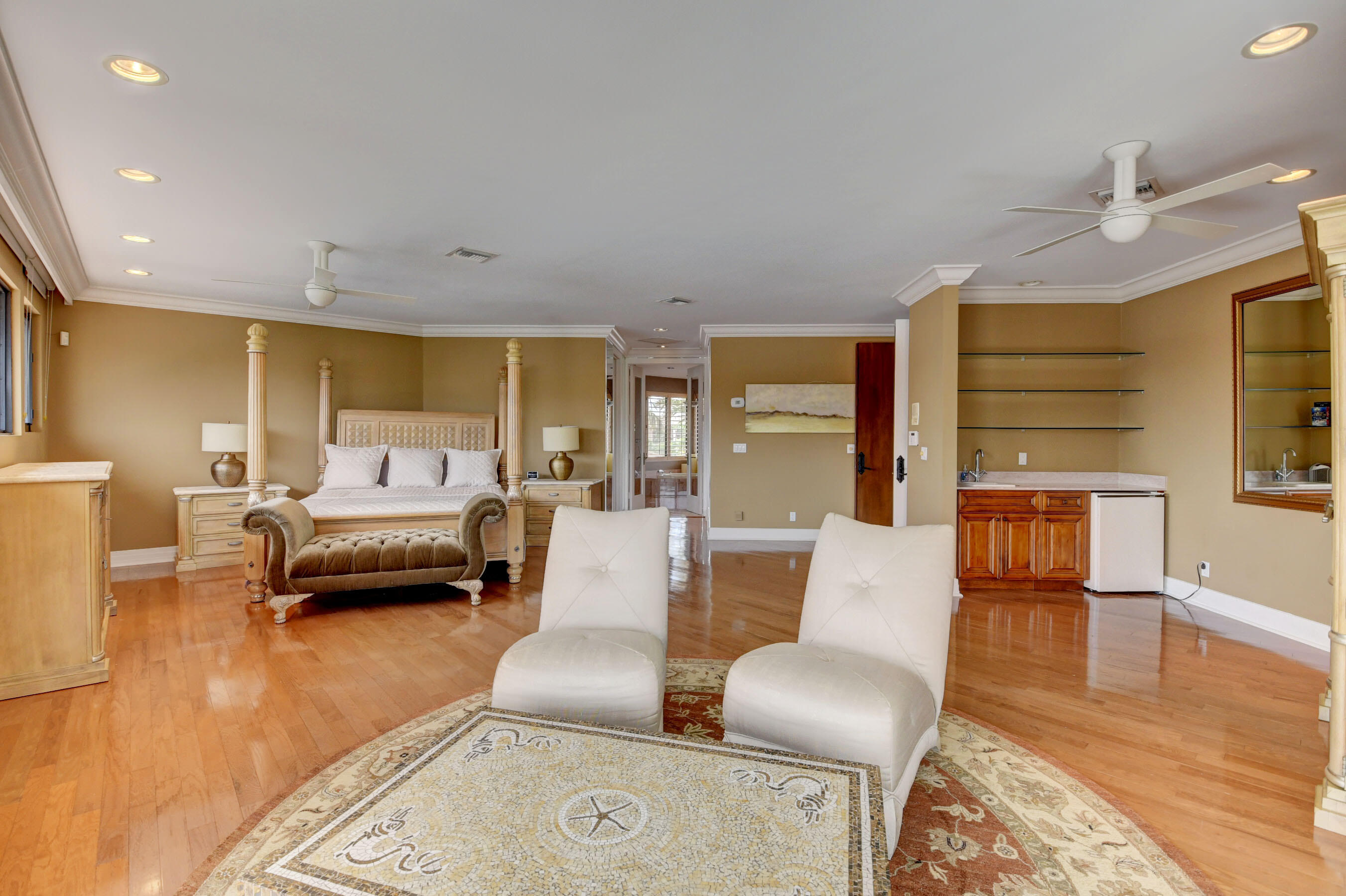 860 Northeast 79th Street Boca Raton, FL 33487 - Photo 50 of 109 a living room with furniture and a wooden floor