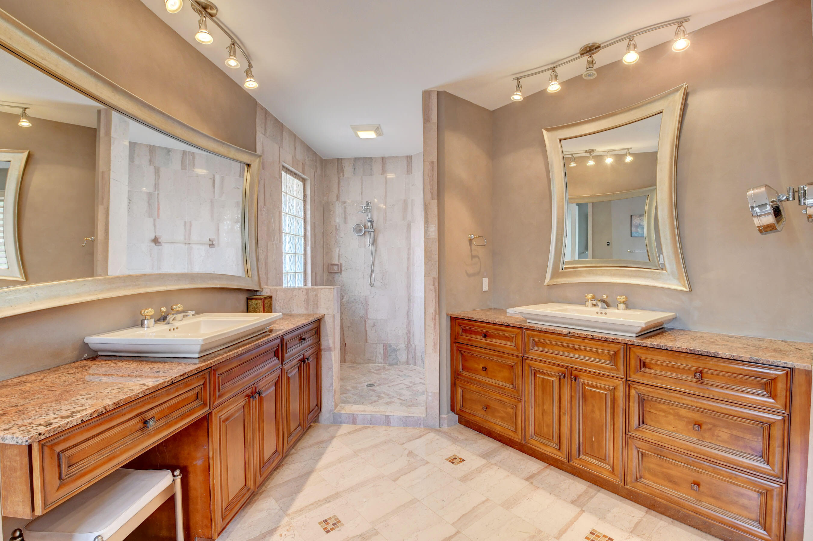 860 Northeast 79th Street Boca Raton, FL 33487 - Photo 56 of 109 a bathroom with a granite countertop double vanity sink mirror and