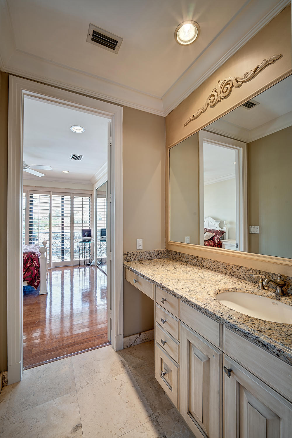 860 Northeast 79th Street Boca Raton, FL 33487 - Photo 66 of 109 a bathroom with a granite countertop sink and a large mirror