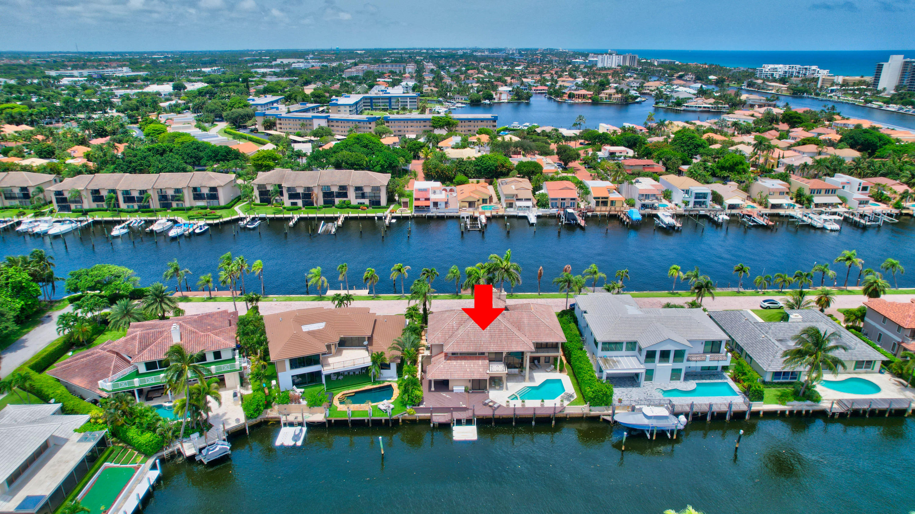 860 Northeast 79th Street Boca Raton, FL 33487 - Photo 86 of 109 an aerial view of residential houses with outdoor space lake view and mountain view in back