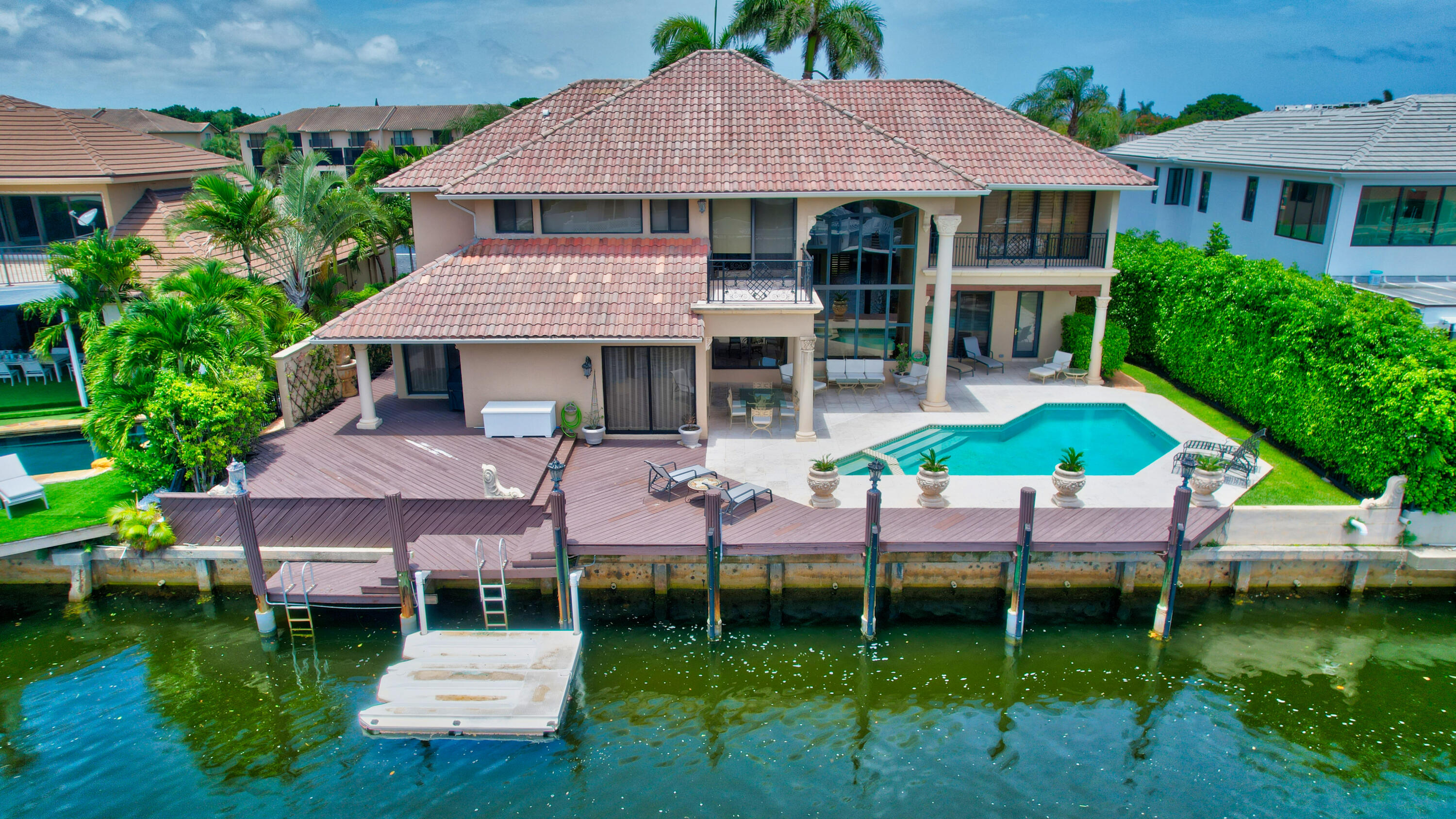 860 Northeast 79th Street Boca Raton, FL 33487 - Photo 90 of 109 an aerial view of a house with swimming pool patio and outdoor seating