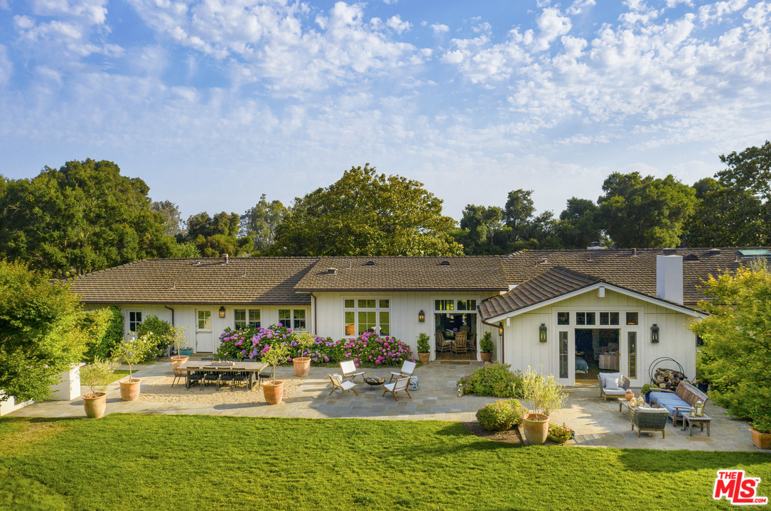 4646 Via Roblada Santa Barbara, CA 93110 - Photo 3 of 36 a aerial view of a house with swimming pool and furniture