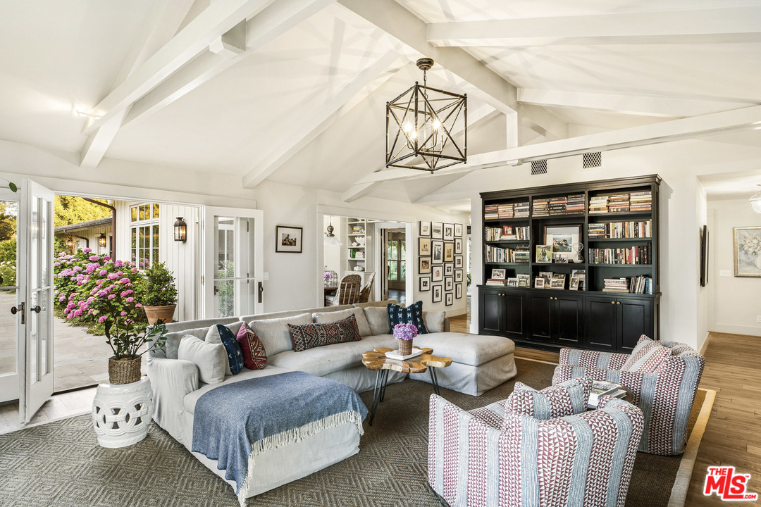 4646 Via Roblada Santa Barbara, CA 93110 - Photo 21 of 36 a living room with furniture and a large window