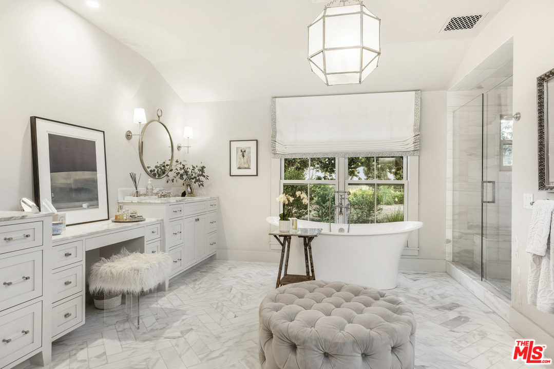 4646 Via Roblada Santa Barbara, CA 93110 - Photo 25 of 36 a bathroom with a sink toilet and shower