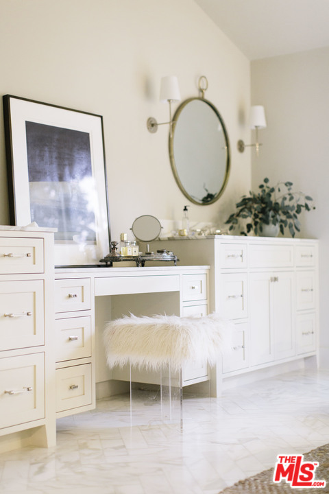 4646 Via Roblada Santa Barbara, CA 93110 - Photo 26 of 36 a bathroom with a granite countertop sink and a mirror