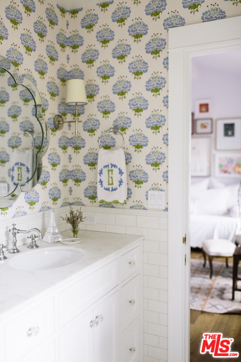 4646 Via Roblada Santa Barbara, CA 93110 - Photo 31 of 36 a bathroom with a sink and a mirror