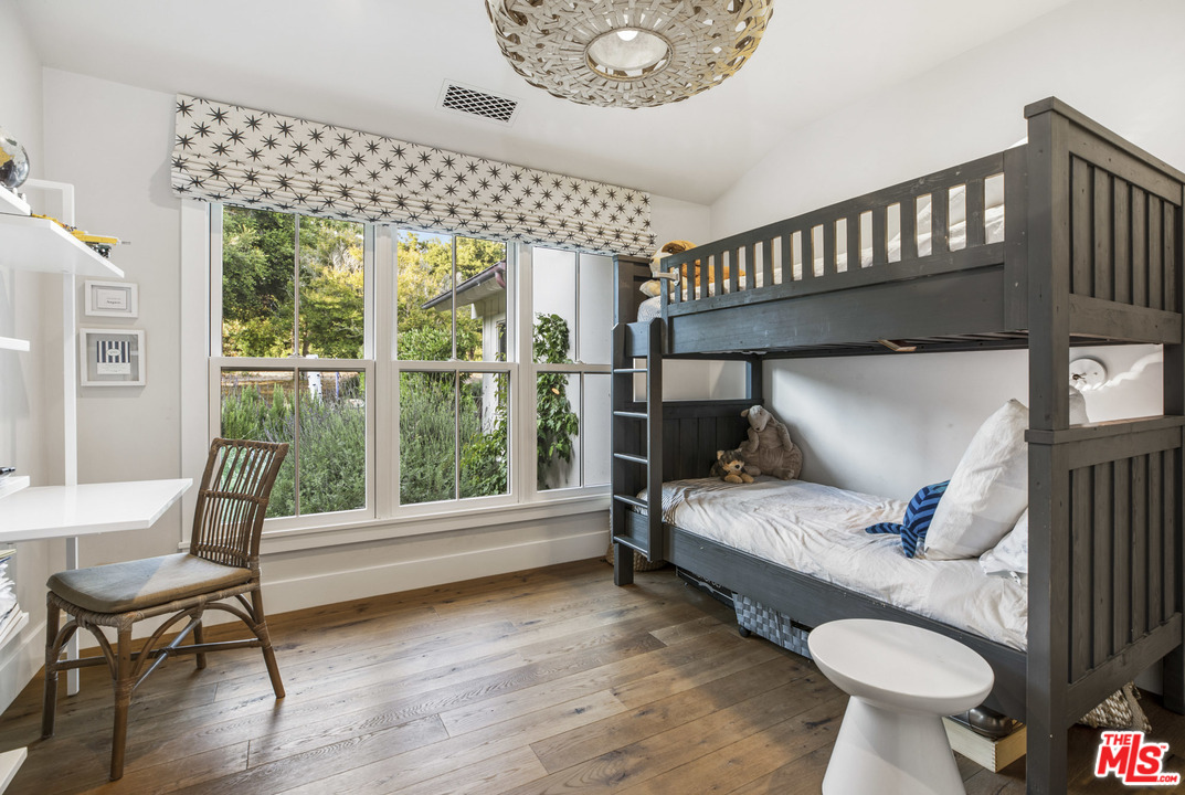 4646 Via Roblada Santa Barbara, CA 93110 - Photo 33 of 36 a bedroom with furniture and a window