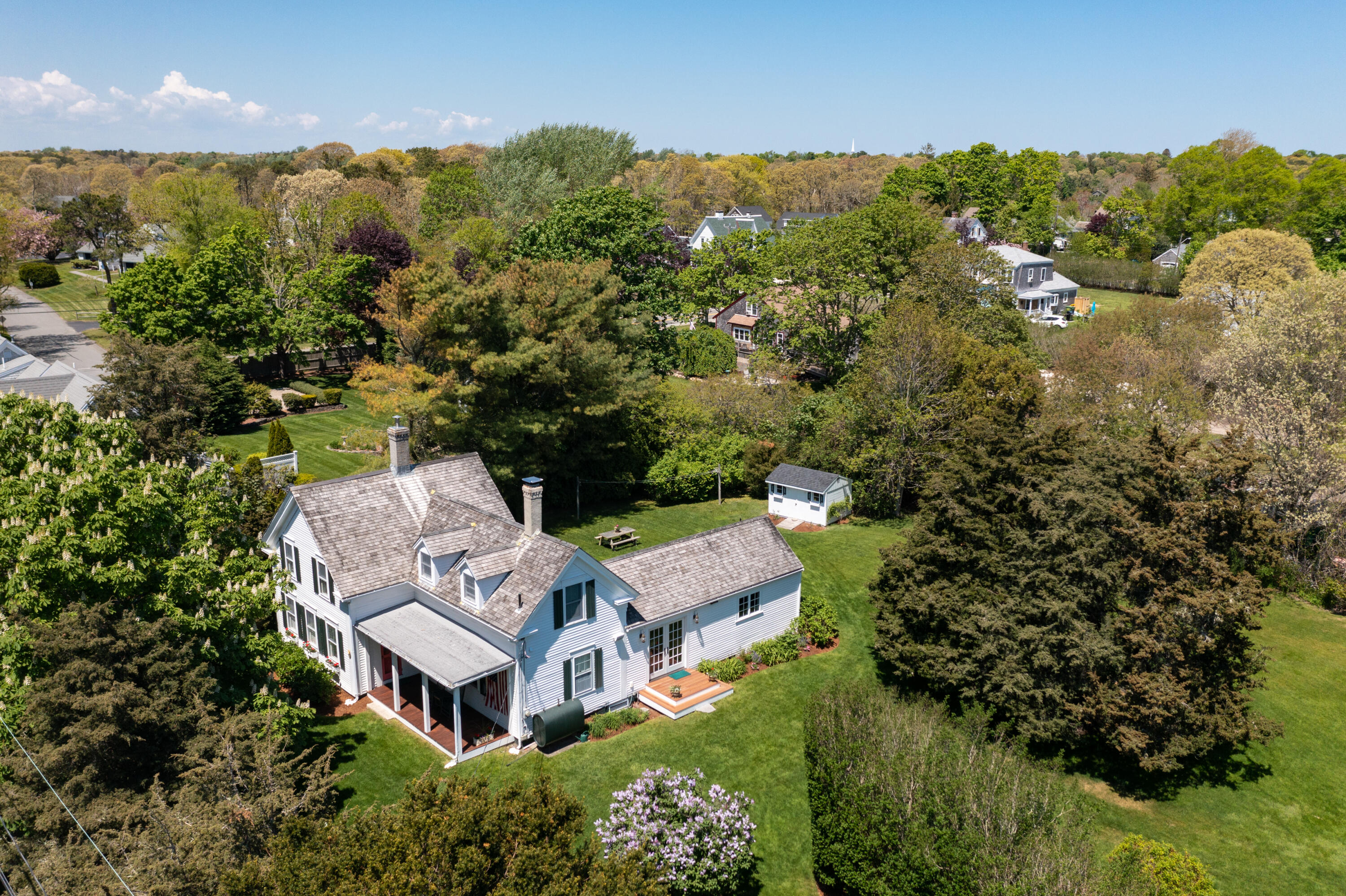 an aerial view of a house with a garden