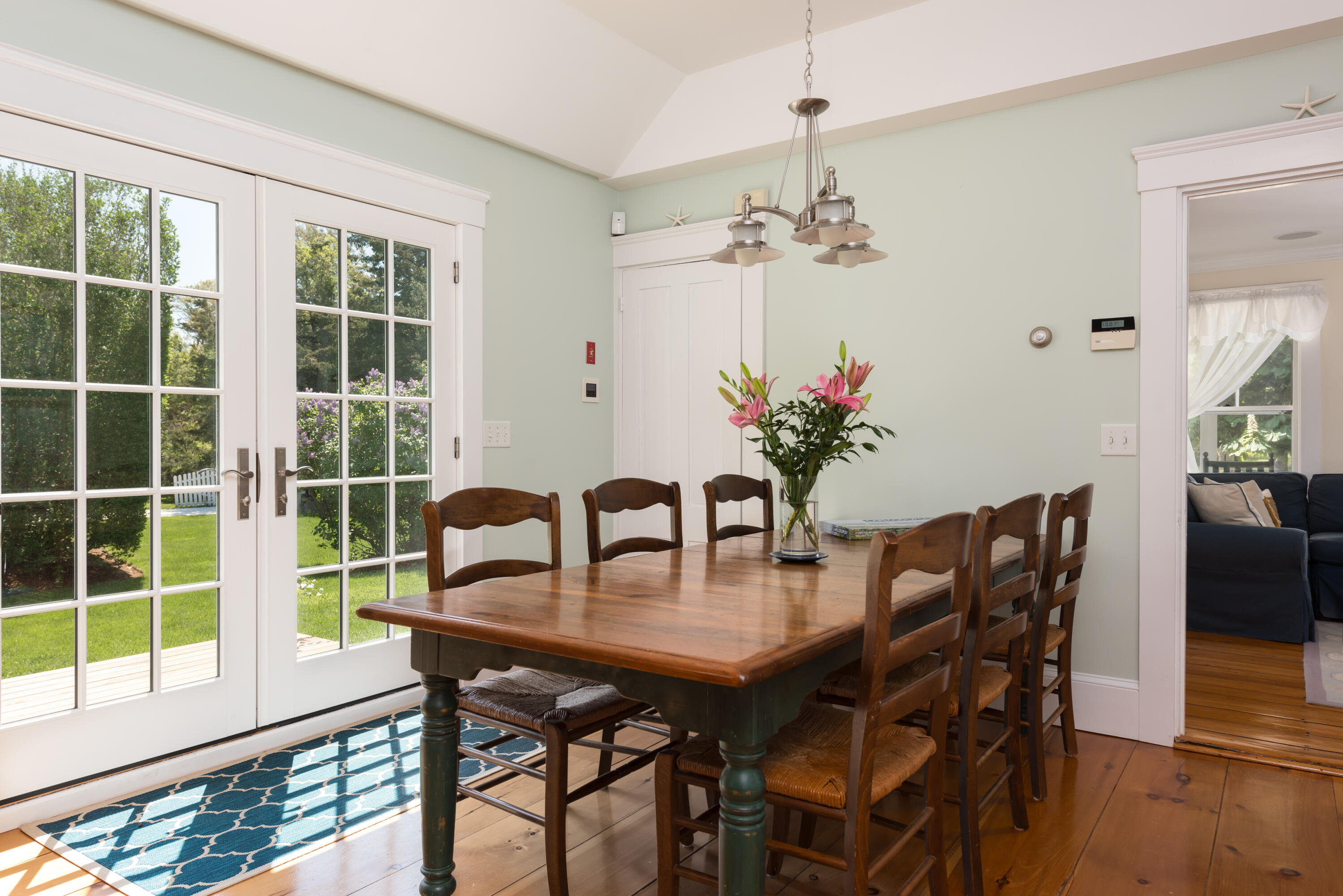 8 Gorham Road Harwich, MA 02645 - Photo 13 of 33 a view of a dining room with furniture window and wooden floor