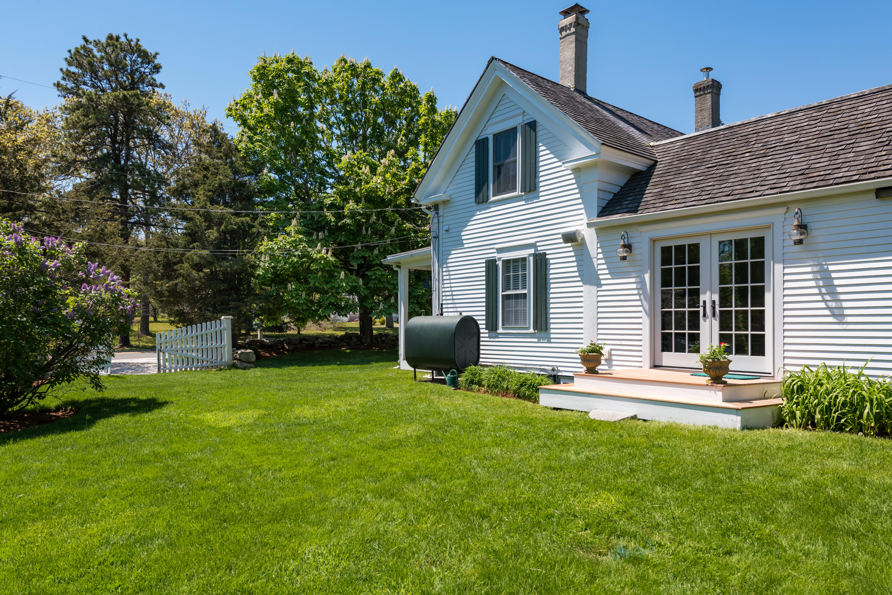 8 Gorham Road Harwich, MA 02645 - Photo 15 of 33 a house view with a sitting space and garden