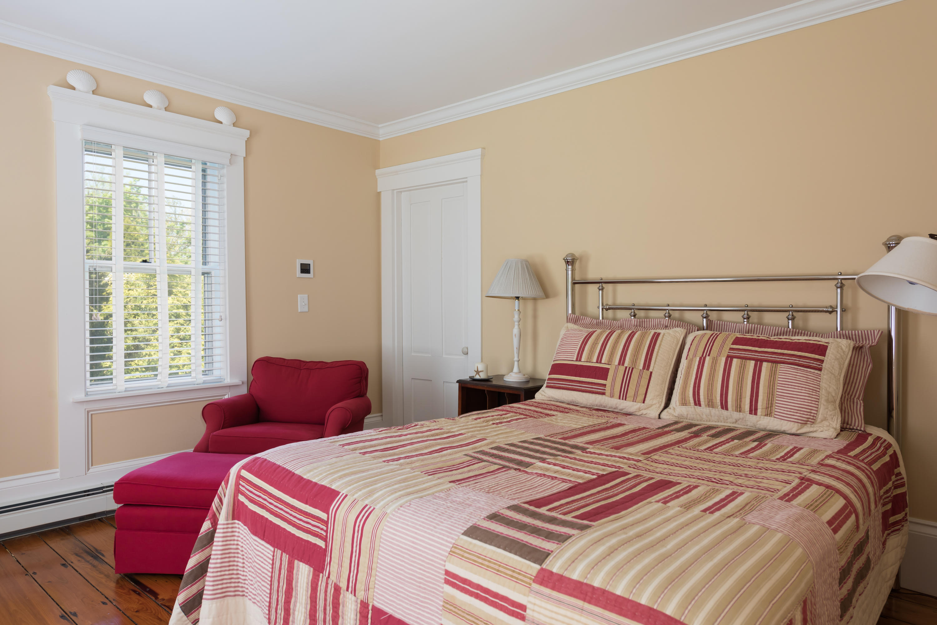 8 Gorham Road Harwich, MA 02645 - Photo 19 of 33 a bedroom with a bed and a window