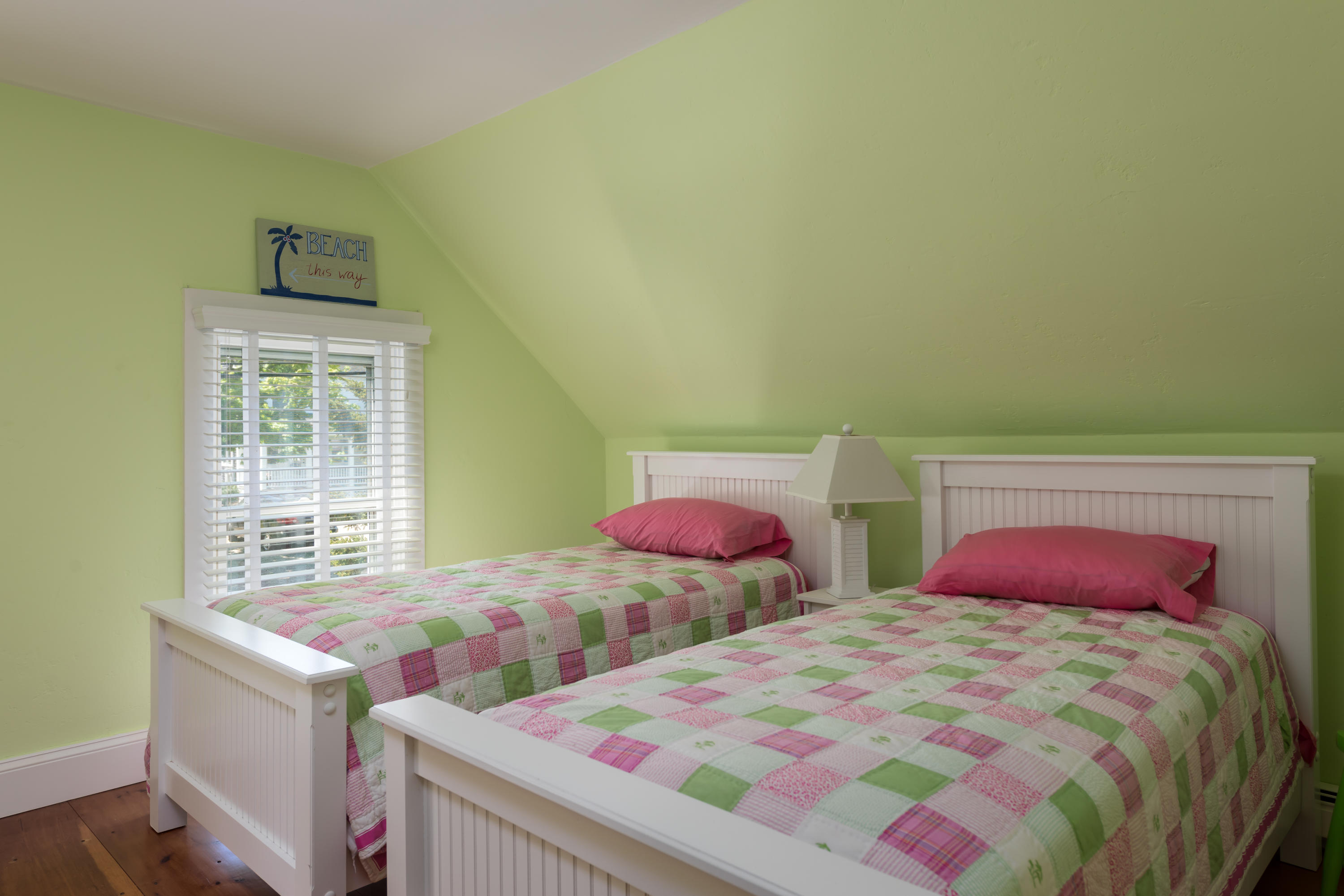 8 Gorham Road Harwich, MA 02645 - Photo 20 of 33 a bedroom with two beds and a window