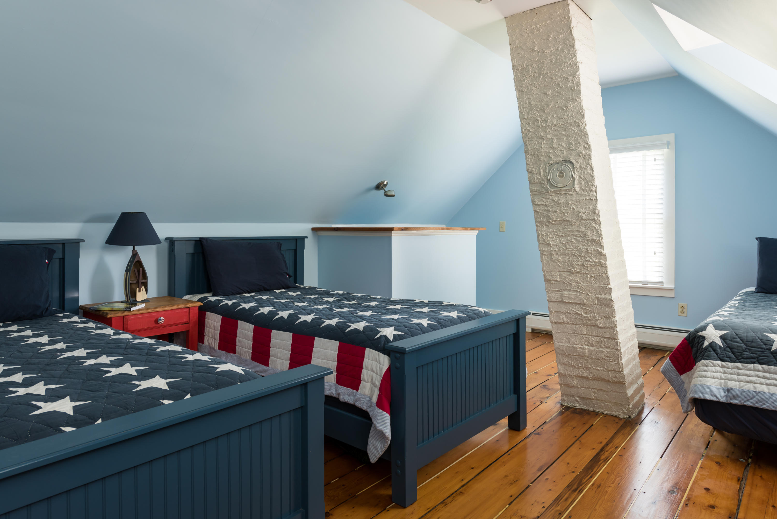 8 Gorham Road Harwich, MA 02645 - Photo 21 of 33 a bedroom with a bed and a dresser next to a window