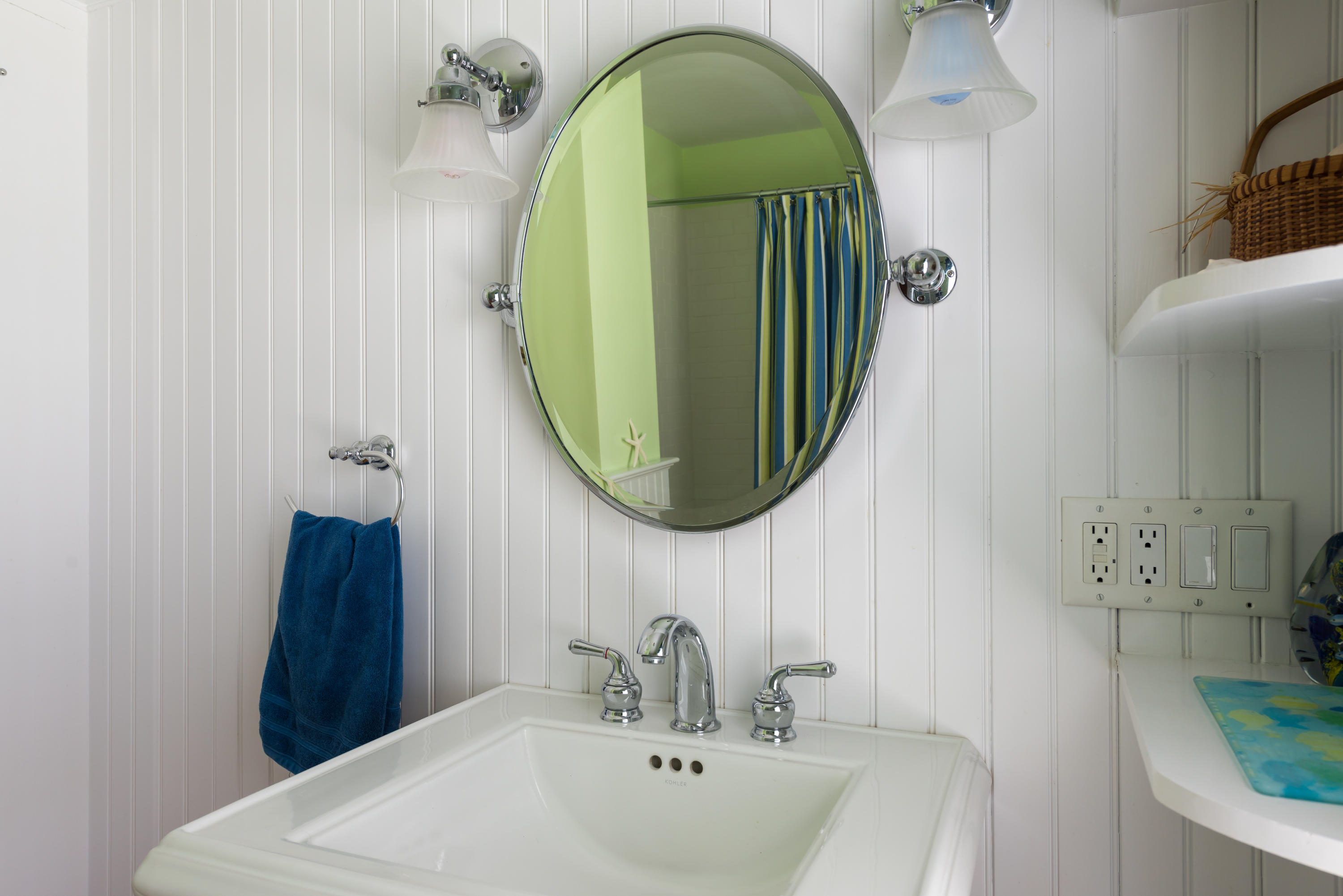 8 Gorham Road Harwich, MA 02645 - Photo 22 of 33 a bathroom with a sink and a mirror