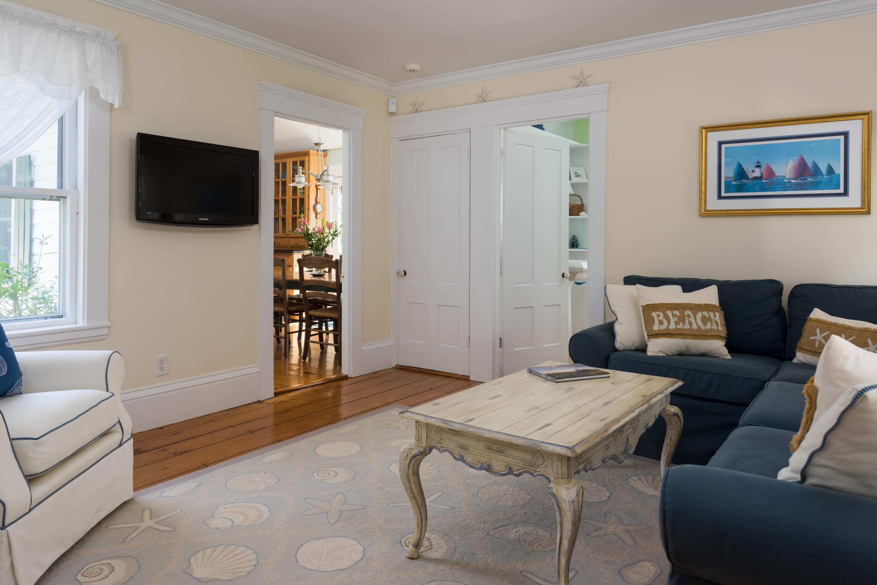 8 Gorham Road Harwich, MA 02645 - Photo 6 of 33 a living room with furniture and a flat screen tv
