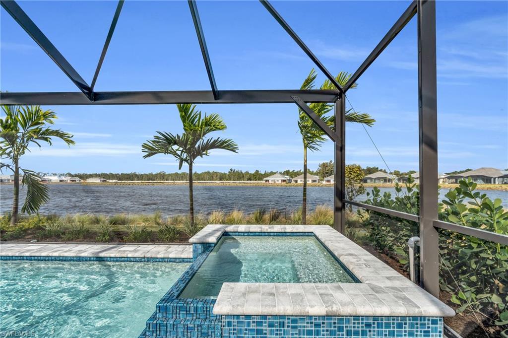 8795 Calypso Court Naples, FL 34113 - Photo 34 of 49 a view of a balcony with chairs
